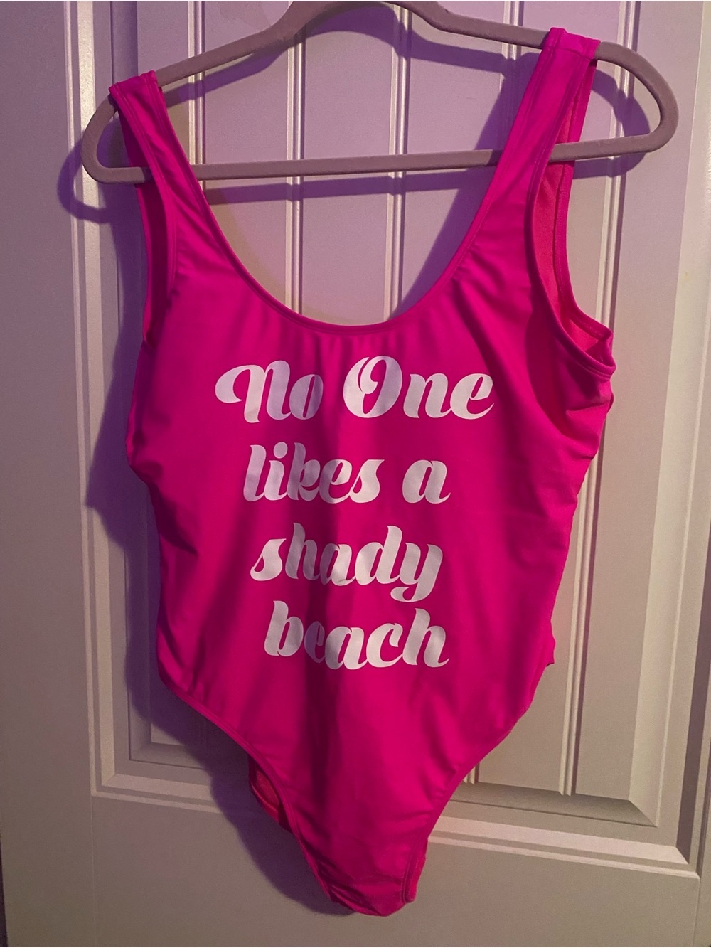 Woman Hot Pink One-Piece Swimsuit with White Slogan Lettering